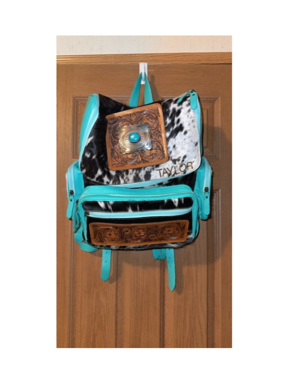 Genuine cowhide and tooled leather backpack